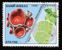 Známka ze série vydané Republikou Guinea-Bissau r. 1988. Kromě plodnic makromycet ukazují také příklady mikroskopických hub. Blíže v textu. Snímek z archivu A. Novákové